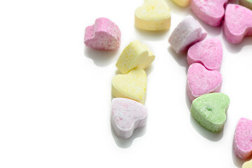 Pink and purple heart shaped candies. Valentine's day background. 2
