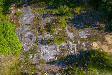Aerial view of The Canadian Shield fragment form above. Laurentian Plateau, large geologic area of exposed Precambrian igneous and high-grade metamorphic rocks. Ancient core in the North American. © ﻿ MotionPixxleStudio