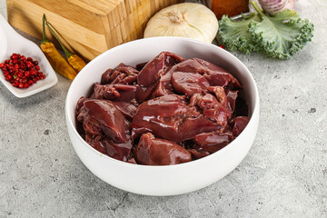 Raw uncooked chicken liver in the bowl