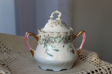 The old porcelain sugar - bowl.