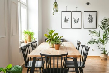Minimalist interior design of a modern dining room with a beautiful wooden table, black chairs and white walls. With a window, plants as home decor