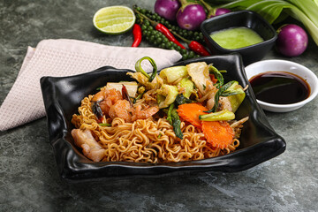 Asian cuisine - Fried noodles with seafood