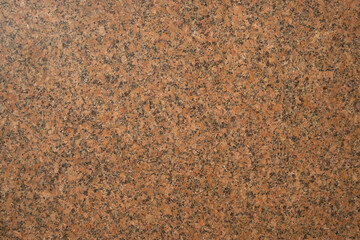 Close up of polished granite wall on building