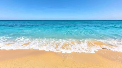 Tranquil beach landscape with golden sands and clear blue sky for text placement