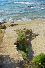 Old concrete stairss on a sandy beach