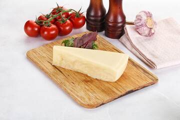 Piece Italian hard parmesan cheese