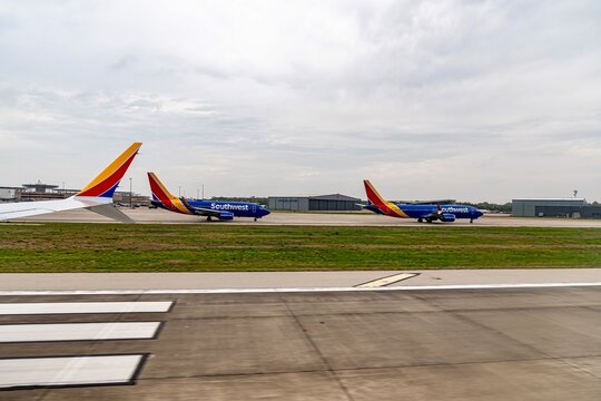 Houston, TX, USA - 03.15.2024
- Southwest Airlines airplanes parked and awaiting departure times during a grounding event for inclement weather 