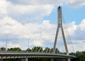 Fototapeta na wymiar Swietokrzyski bridge over the Vistula river in Warsaw