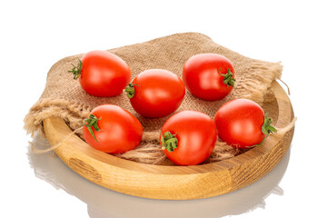 Several ripe cherry tomatoes on a wooden tray, macro, isolated on white background.