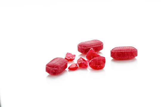 Fruit red candies isolated on white background 7