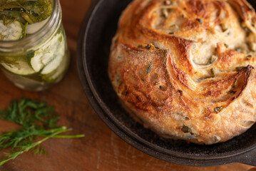 Homemade sourdough bread stuffed with dill pickle and white cheddar cheese