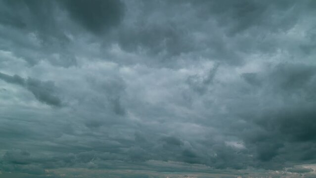Dramatic Dark Thunderclouds. Storm Cloudy Dramatic Sky With Dark Rain Grey Cumulus Clouds.