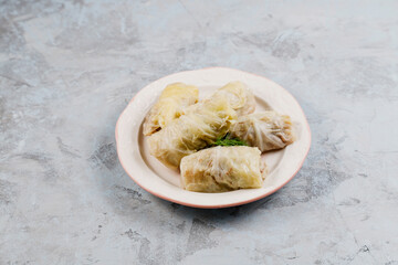 Dolma - stuffed grape leaves with rice and meat.