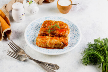 Dolma - stuffed grape leaves with rice and meat.