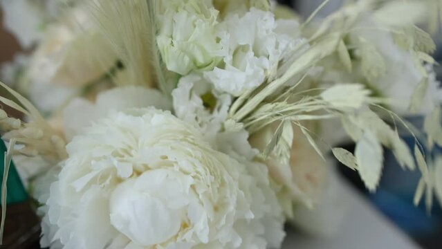a bouquet of white flowers close-up, a bride's bouquet for a wedding, a birthday present