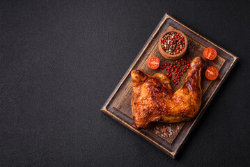 Delicious grilled chicken leg or quarter with salt and spices