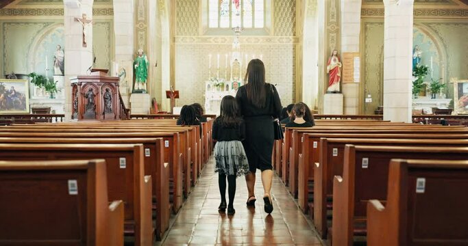 Family, church and catholic for funeral, walking isle and sunday service for condolences and death. Mom, daughter and benches at cathedral, synagogue and back view for chapel and sad farewell