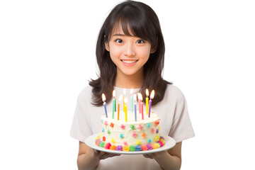 Fototapeta premium Teen pretty Japanese girl holding birthday cake on isolated chroma key background