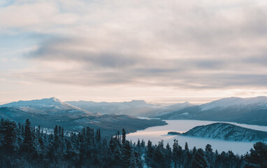 Serene Norwegian Fjord: Winter Sunbreak in Subzero Landscape