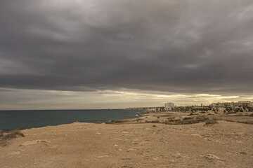 Stormy sky on La Zenia beach in Alicante. Spain