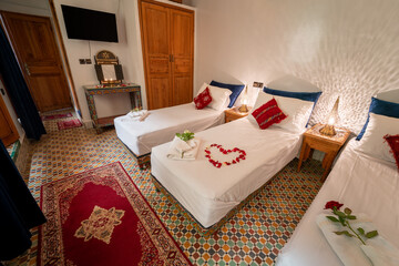 Beautiful interior of a bedroom inside a riad in the medina of Fes, Morocco