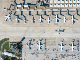Aerial view of an airport. aerial view of airport terminal with parked airplanes