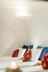 Beautiful interior of a bedroom inside a riad in the medina of Fes, Morocco