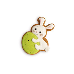 Gingerbread in the shape of a bunny with an easter egg decorated with colored icing, isolated on a white background. Easter decoration. Close-up.