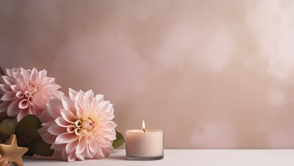 An incredible atmosphere,dahlias and aromatic candles on a gentle background of pastel colors 
