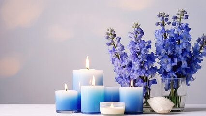 An incredible atmosphere,orchis and aromatic candles on a gentle background of pastel colors 

