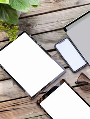 Open laptop with digital tablet and white smartphone. All with isolated screen on old wooden desk.