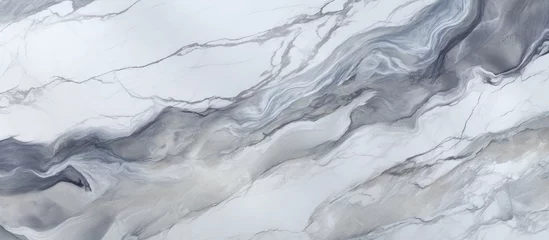 Foto op Plexiglas A closeup of a grey and white marble texture resembling a freezing ice cap landscape, with wind waves sculpting the liquid surface of the slope © AkuAku