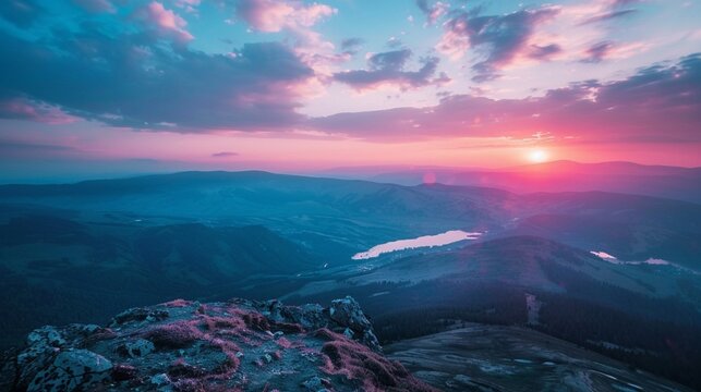 Crisp, clear view of the world from a mountaintop, overlooking vast valleys and shimmering lakes below, the distant horizon painted with hues of blue and purple as the sun sets