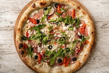delicious tasty cheese pizza with ham on wooden table