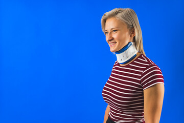 a caucasian woman having neck problems and wearing brace collar, studio shot copy space. High quality photo - Powered by Adobe
