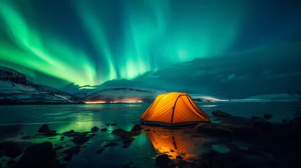 Foto auf Alu-Dibond A glowing yellow camping tent under a beautiful green northern lights aurora. Travel adventure landscape background. Photo composite. © Super Stocks