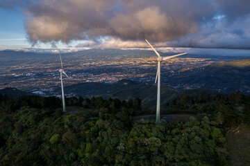 Beautiful aerial view of the renewable energy Windmills in Costa Rica at the sunset