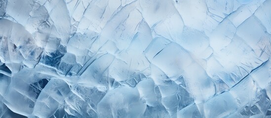 A detailed shot of a chunk of electric blue ice from a polar ice cap. The freezing process created a unique pattern on the glacial landform