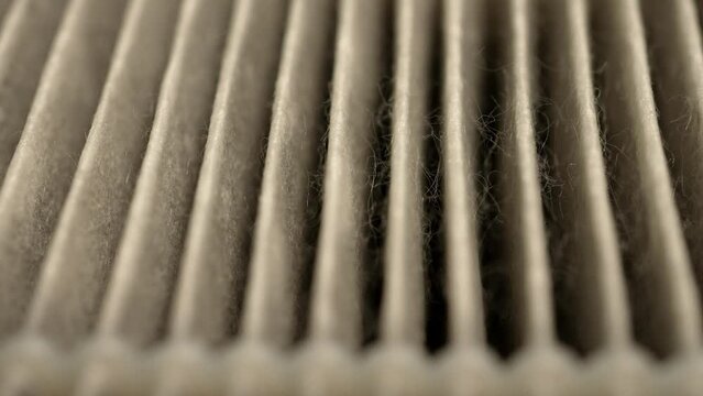 Air filter HEPA macro close up for removing fine particles and refresh indoor air. Air purifier filter for fresh healthy air, used for cleaning and removing allergen dust. Shallow depth of field.