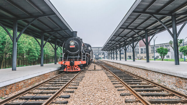 Vintage Steam Train Approaching Old Station Platform