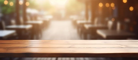 Foto op Plexiglas Rustic Wooden Tabletop Amidst Blurred Restaurant Ambiance, Perfect for Dining Concepts © Ilgun
