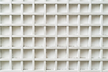 Symmetrical tiled white grid background