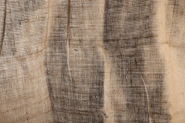 Texture of natural burlap fabric as background, closeup