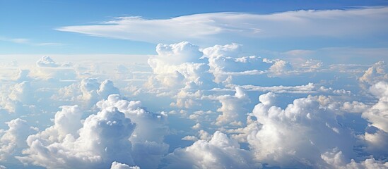 Awe-Inspiring Aerial View of Scattered Clouds and Sunlight from Inside Airplane Window