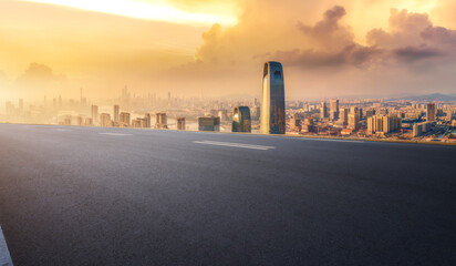 Sunrise Horizon and Cityscape from Open Road