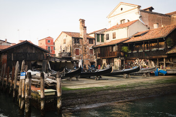 Gondola garage with gondoliers working. Venice, Italy.