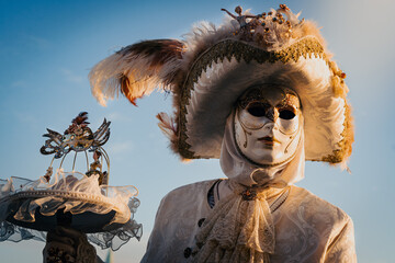 Traditional costumes and masks for venetian carnival in Venice, Italy