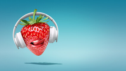 Summer minimalist pop art photography made with  strawberry wearing headphones and listening to music.Minimal concept summer and party.Celebrating the summer vibes.Creative art.Contemporary style.
