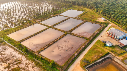 Aerial view wastewater treatment pond. Top view Bio-gas waste water treatment pond In industrial plants. Water pollution. Image for industrial background: sewage treatment, bioremediation, biogas © Яe Life Яe World