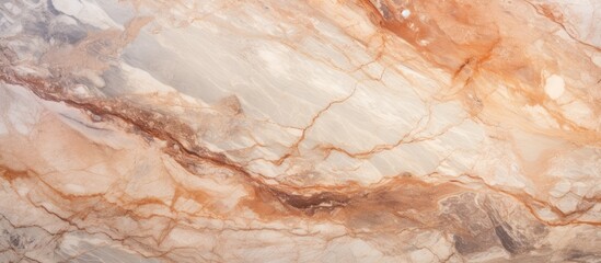 A close up of a marble texture resembling a mix of beige, peach, and brown tones. The pattern reminds of wood grain, making it a versatile natural material for cuisine dishes